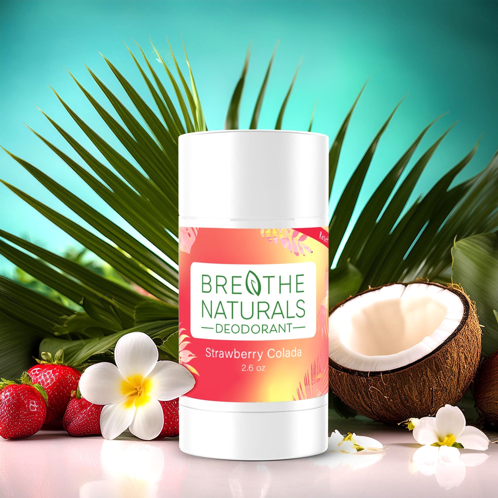 Breathe Naturals Strawberry Colada deodorant sits amongst strawberries, coconut, and tropical flowers, promoting its natural ingredients.
