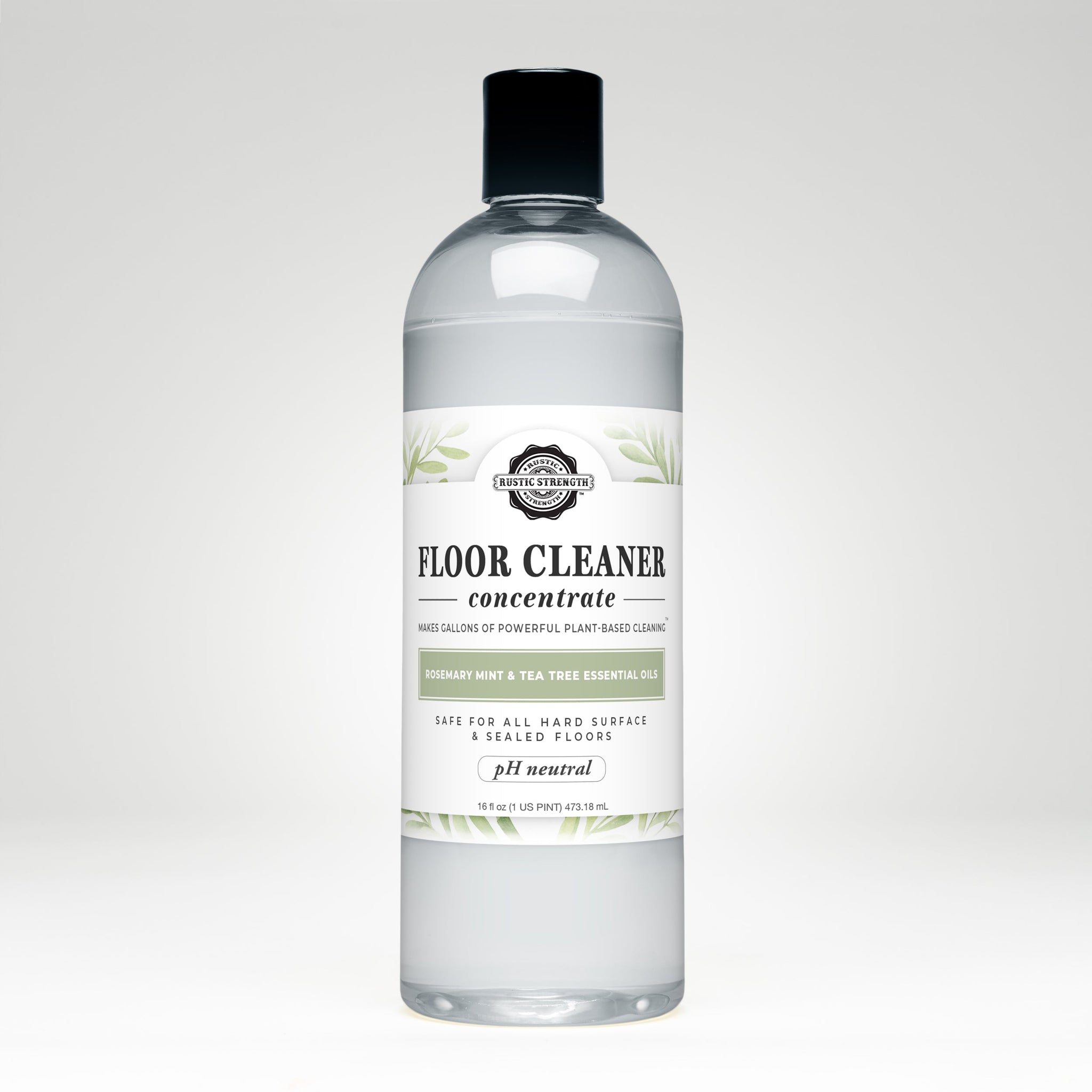 Bottle displays Rustic Strength floor cleaner concentrate, a plant-based, rosemary mint and tea tree essential oil cleaning product.
