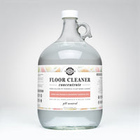 Rustic Strength plant-based floor cleaner concentrate, infused with lemon, lime, orange, and grapefruit essential oils, promises a safe and powerful clean for hard surfaces and sealed floors.