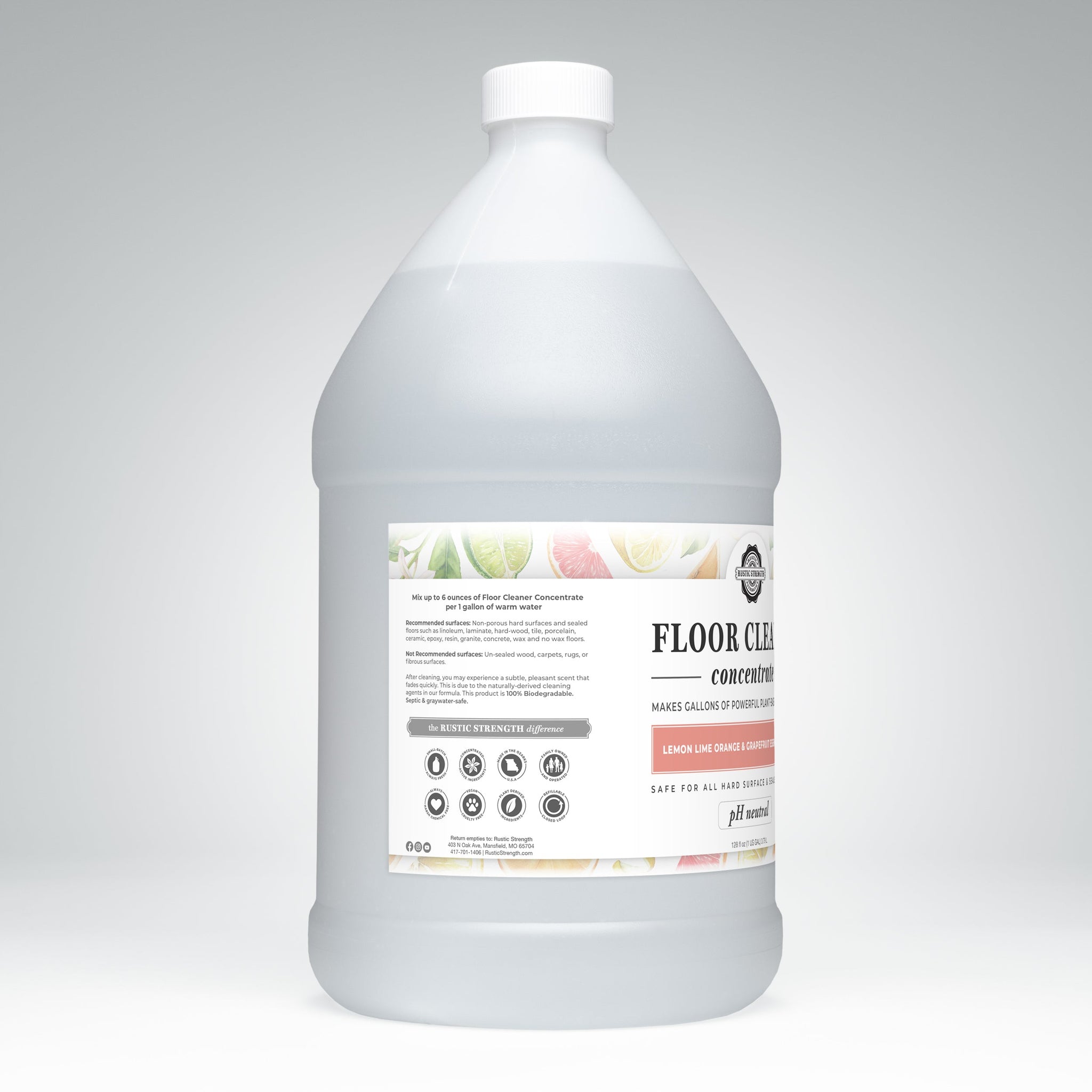 A gallon jug showcases Rustic Strength Floor Cleaner Concentrate with lemon, lime, orange, and grapefruit scents for a safe and effective hard surface cleaning solution.
