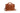 A brown leather satchel handbag featuring a top handle and shoulder strap sits against a white background.
