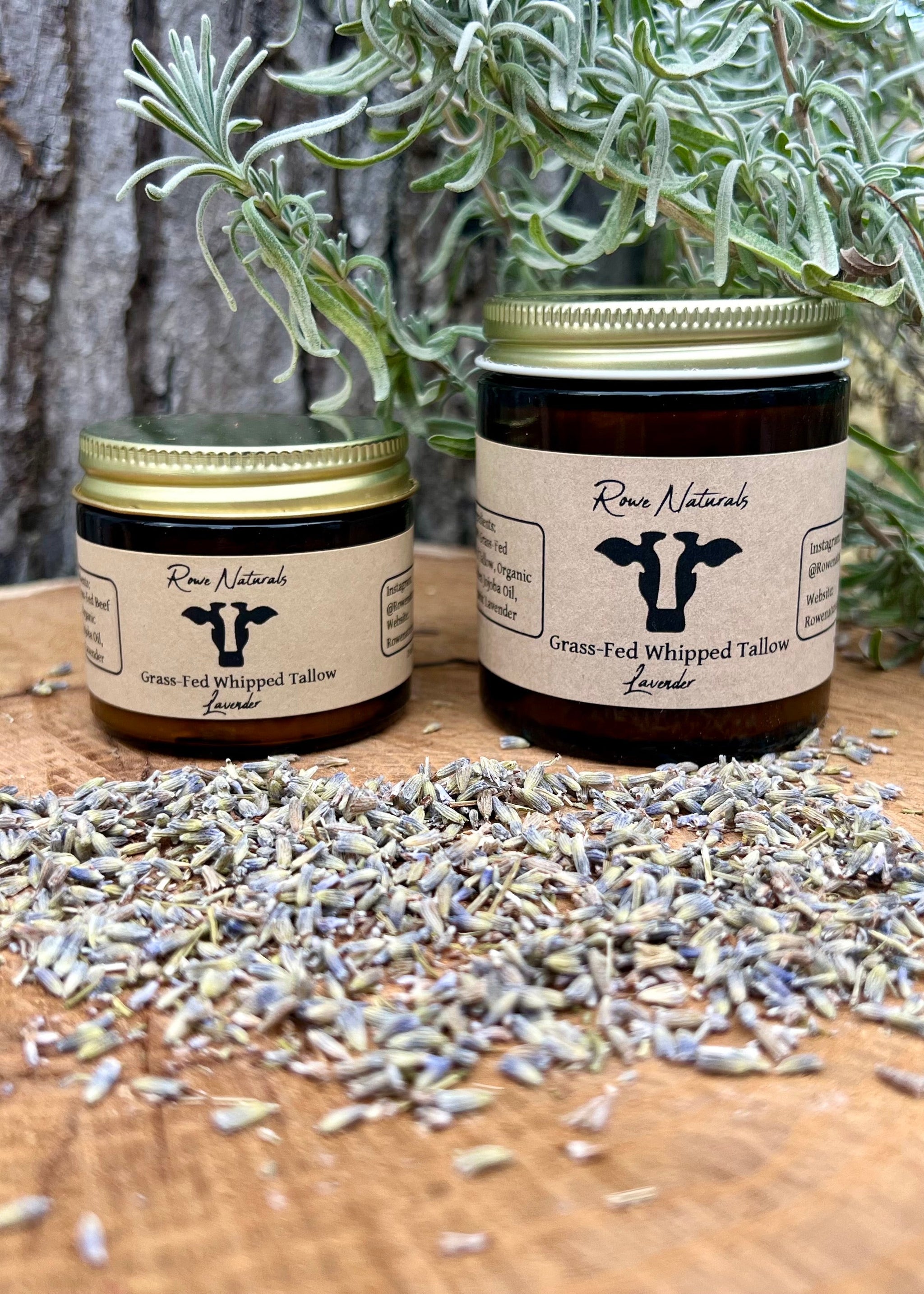 Two jars of Rowe Naturals grass-fed whipped tallow lavender skincare product sit among scattered dried lavender buds.