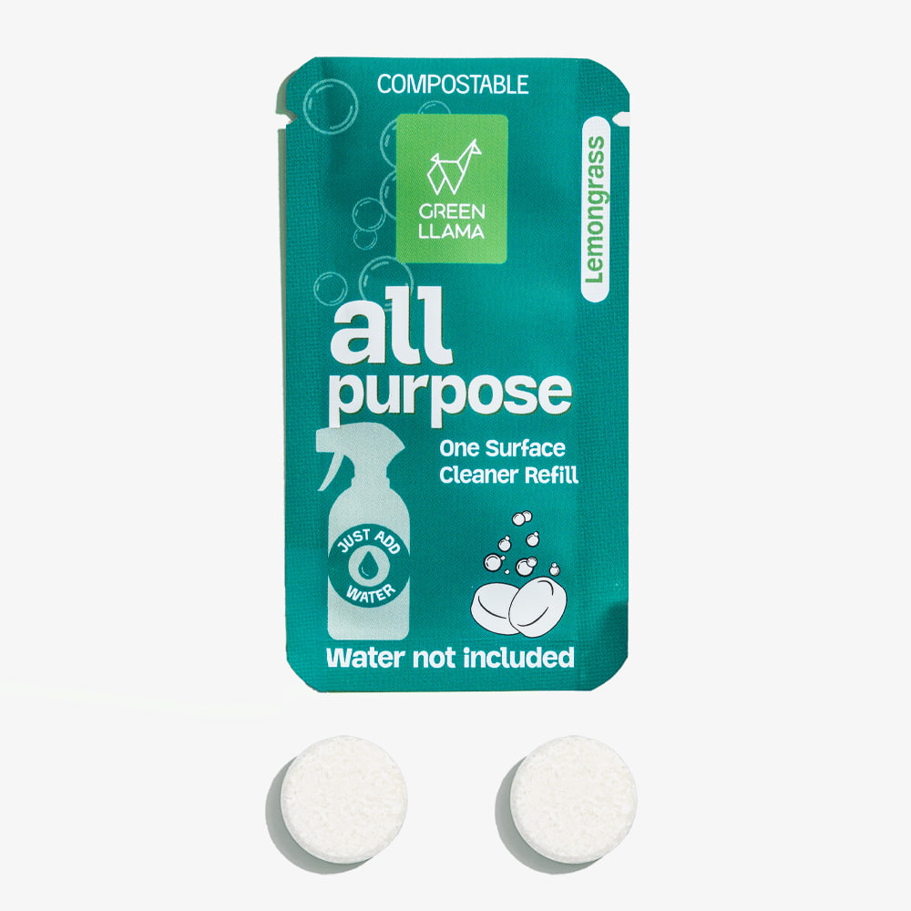 Green Llama's compostable all-purpose cleaner refill kit shows lemongrass-scented tablets and a packet that instructs to just add water.