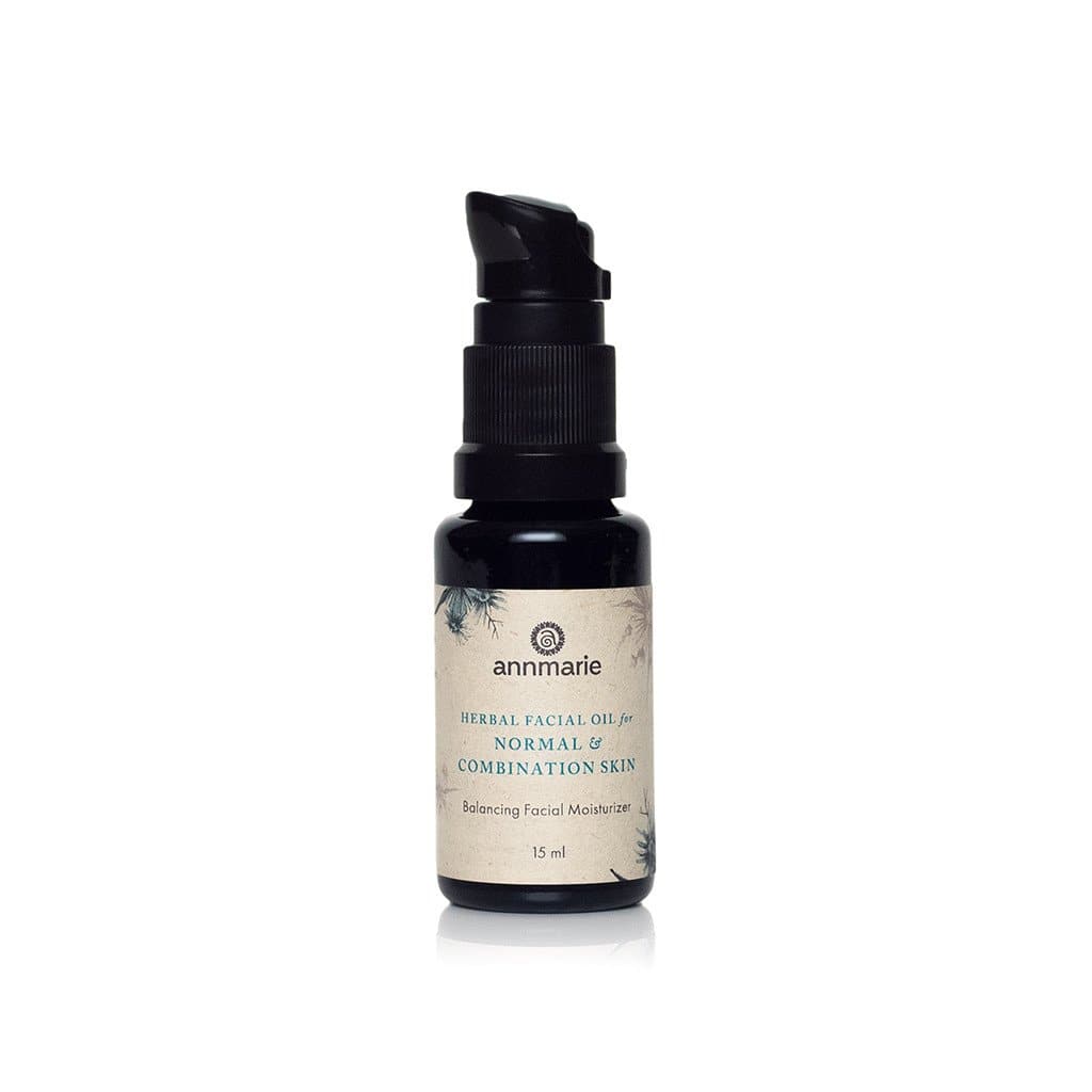 Annmarie Herbal Facial Oil balances normal and combination skin, featuring a pump-top bottle.
