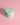 VanMan's Pearl Eye Cream, featuring natural ingredients and a vintage van illustration, sits prettily on a pink surface.
