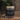 Jar of Slow North Palo Santo Incense Cones on a wooden surface with green leaves in the background