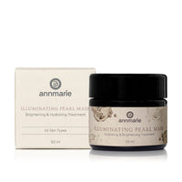 Annmarie's Illuminating Pearl Mask, a hydrating and brightening treatment for all skin types, sits next to its product box.
