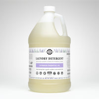 A jug of Rustic Strength laundry detergent advertises its lavender essential oil formula for sensitive skin and 256 loads.