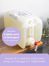 See a large container of lavender essential oil laundry detergent promising a year's worth of washes for families.