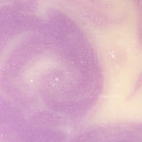 Lavender soap swirls with a creamy white, creating a soothing marble effect.
