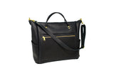 Black leather tote bag displays its front zippered pocket and adjustable shoulder strap.
