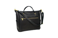 Black leather tote bag displays its front zippered pocket and adjustable shoulder strap.
