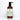 Showcases a bottle of Rustic Strength avocado face and body lotion with rosemary and mint essential oils on a white tile background.