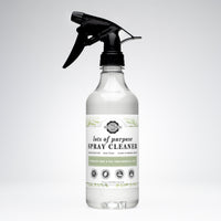Shows a bottle of Rustic Strength lots of purpose spray cleaner with rosemary mint and tea tree essential oils.
