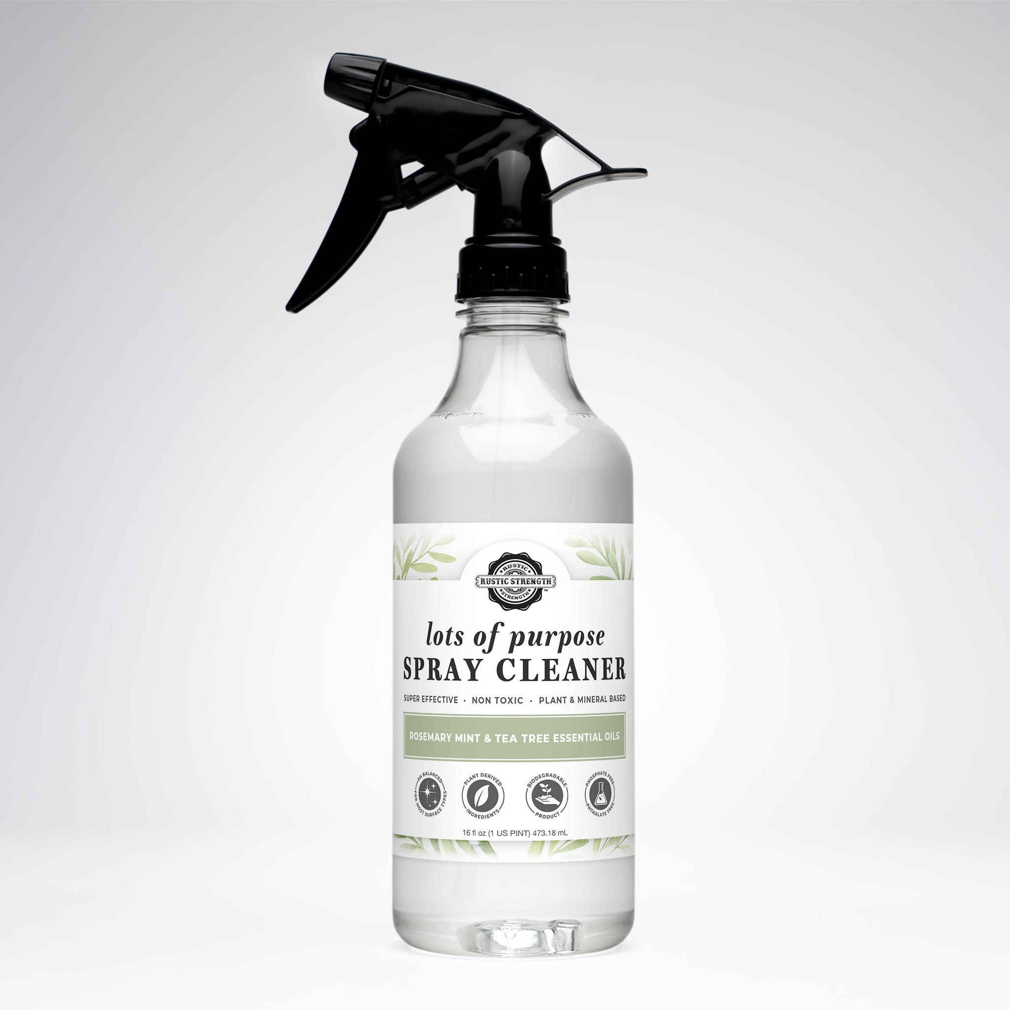 Shows a bottle of Rustic Strength lots of purpose spray cleaner with rosemary mint and tea tree essential oils.
