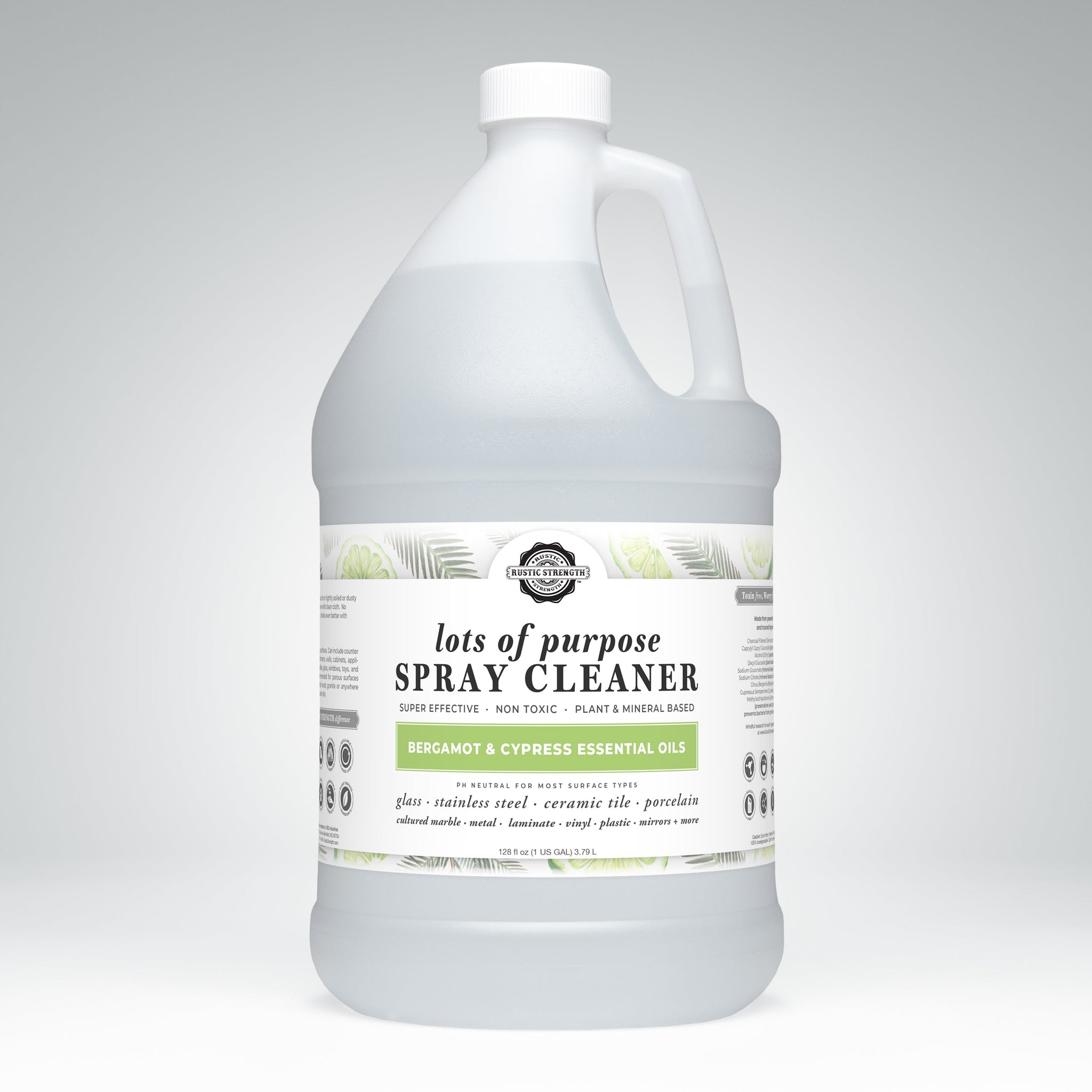 A large jug displays the label for Rustic Strength Lots of Purpose Spray Cleaner, highlighting its bergamot and cypress essential oils.
