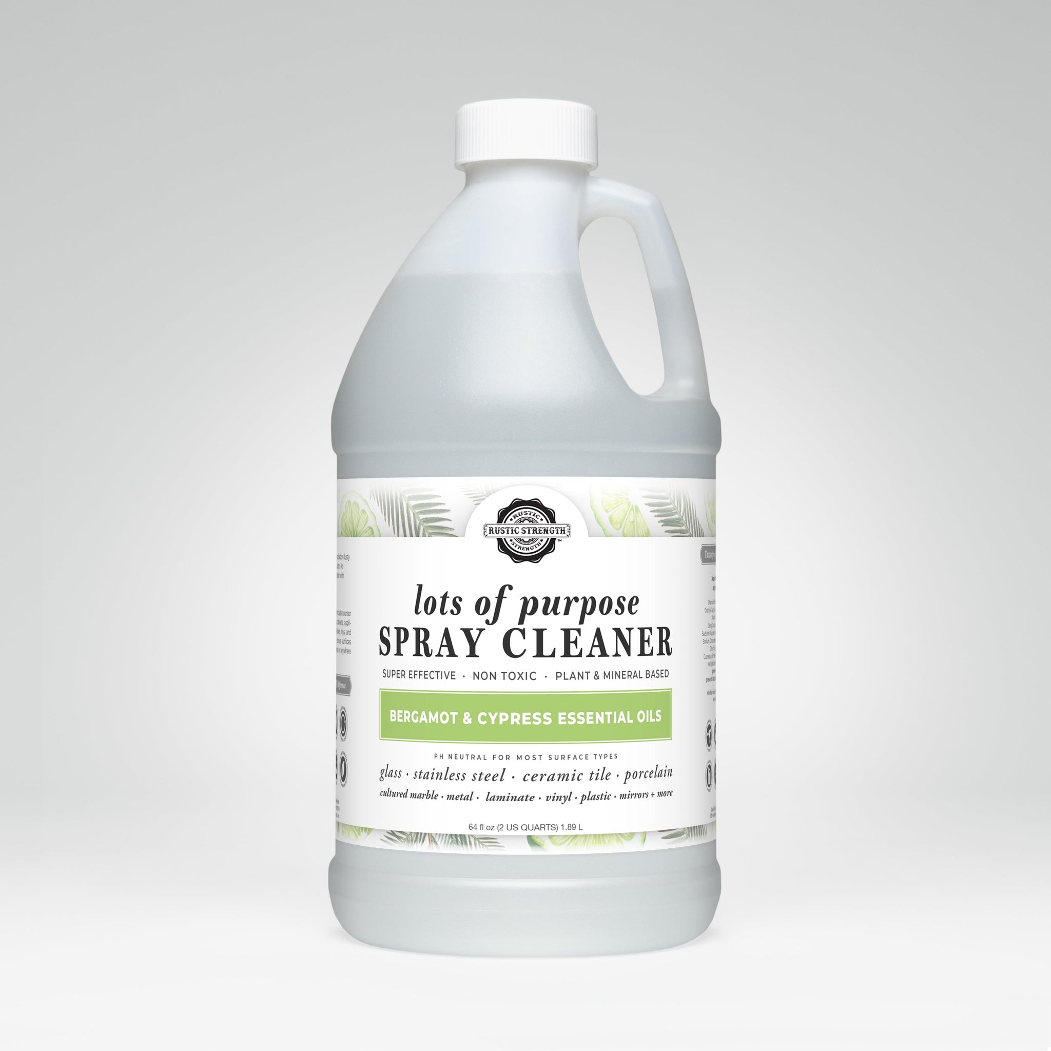 A gallon jug of Lots of Purpose Spray Cleaner with bergamot and cypress essential oils sits against a white background.