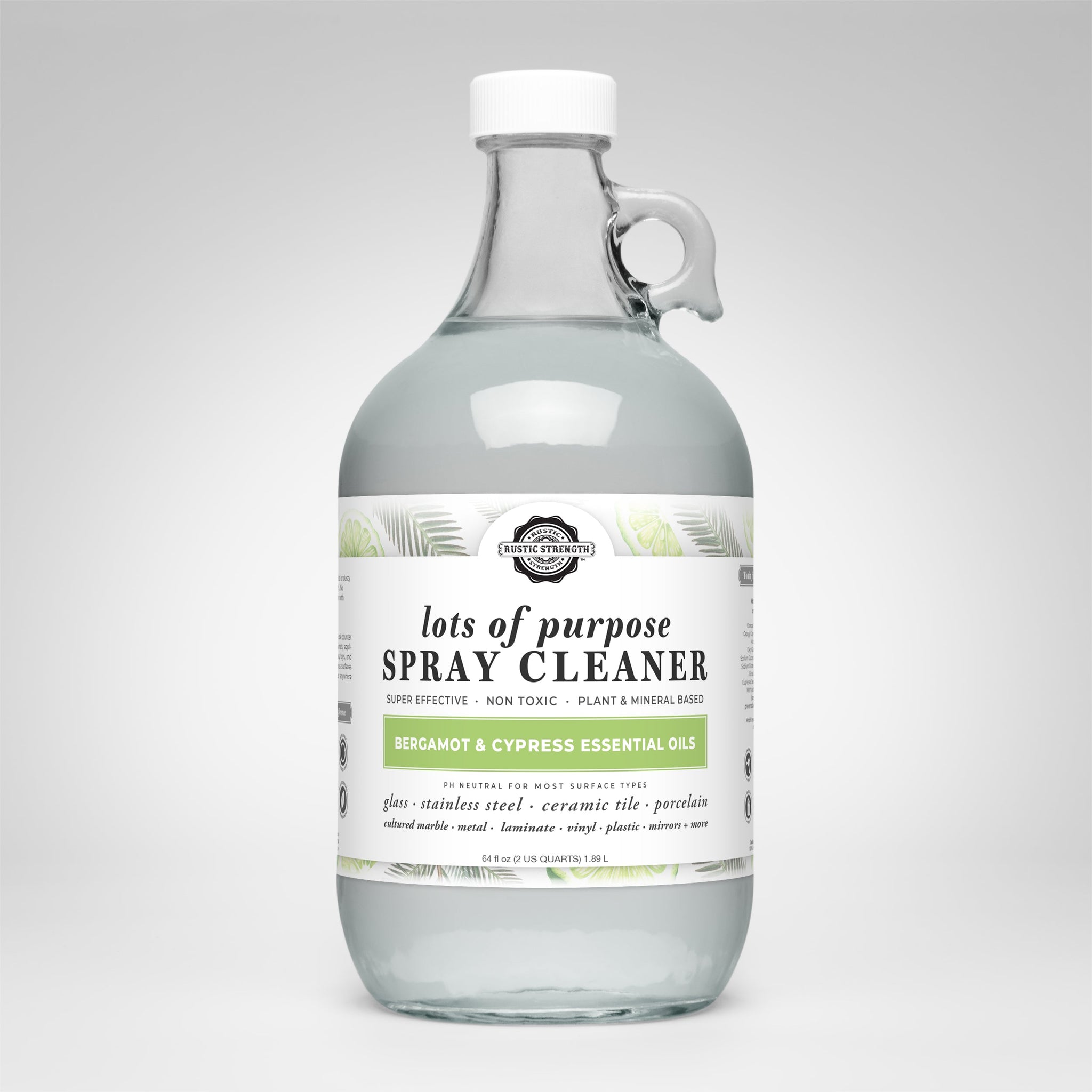 View a glass bottle filled with Rustic Strength Lots of Purpose Spray Cleaner, featuring bergamot and cypress essential oils for cleaning various surfaces.