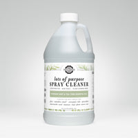 Rustic Strength spray cleaner bottle showcases its plant-based, multi-surface cleaning power with rosemary mint and tea tree essential oils.

