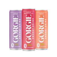 Three colorful Gorgie energy drink cans showcase wild berry, watermelon splash, and peach tea flavors.
