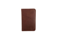 Showcases a brown leather wallet with subtle stitching details and a small embossed logo.
