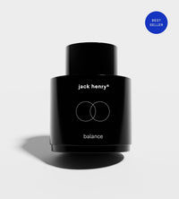 Jack Henry's Balance face oil, a best-selling skincare product, sits against a white background.
