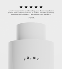 A five-star review highlights a bottle of Karma perfume and praises its beautiful, non-toxic fragrance.
