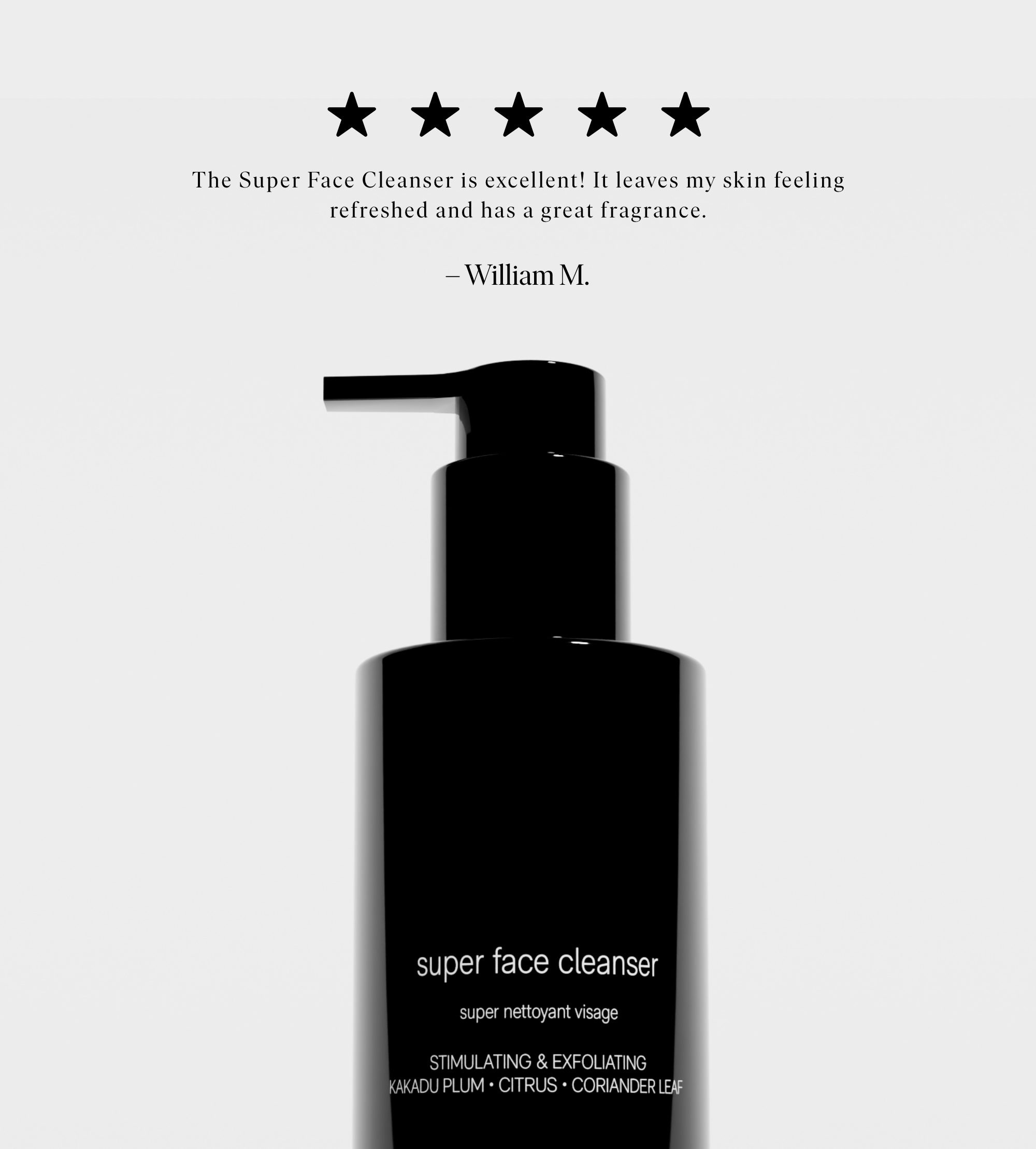 A black bottle of Super Face Cleanser, a stimulating and exfoliating skincare product, receives a five-star customer review.
