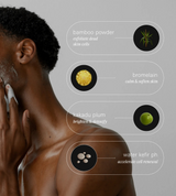 A Black man washes his face with a foaming cleanser featuring natural ingredients like bamboo powder, kakadu plum, bromelain, and water kefir for exfoliating, brightening, calming, and cell renewal benefits.
