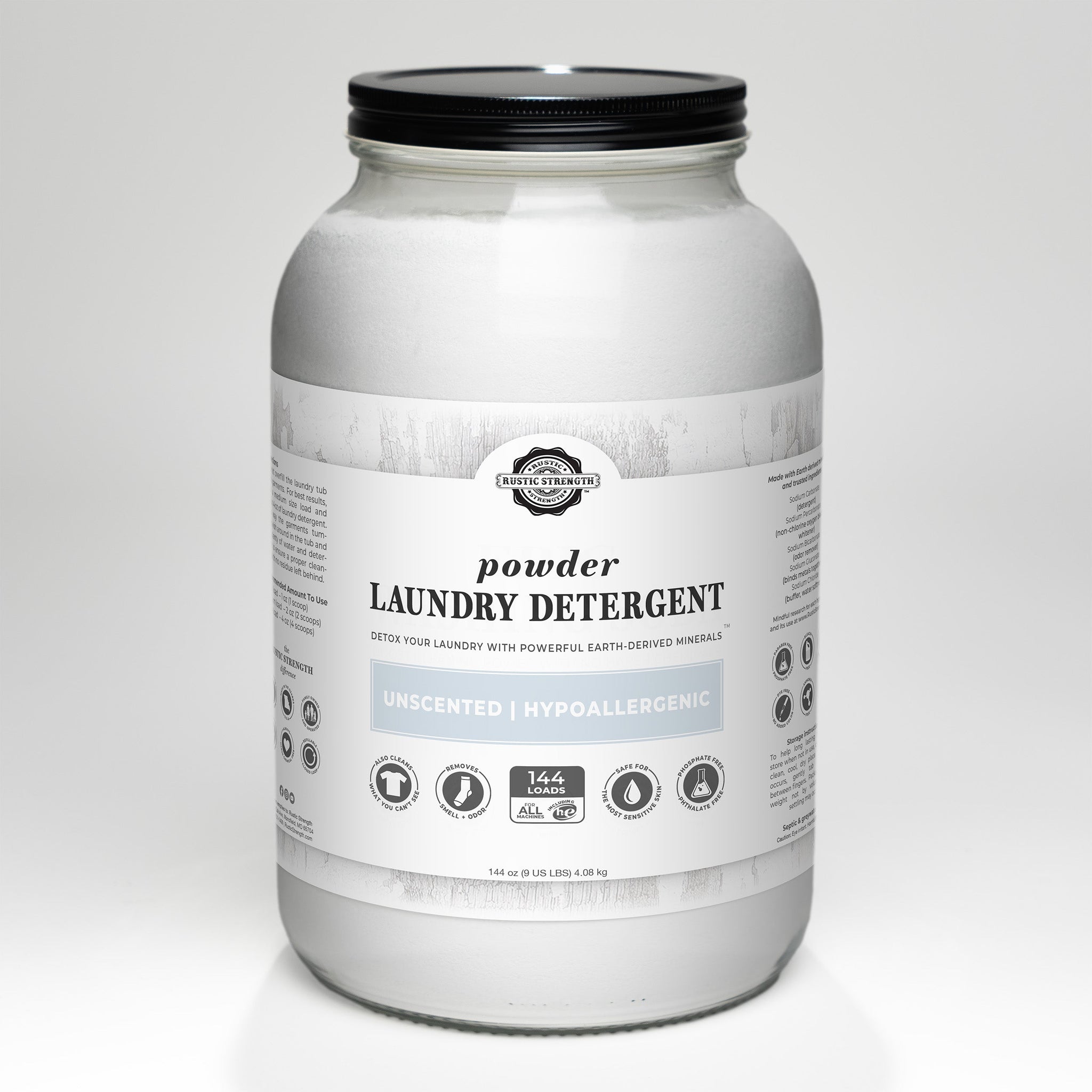 A glass jar holds Rustic Strength unscented, hypoallergenic powder laundry detergent for 144 loads, featuring earth-derived minerals.
