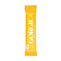 Gorgie Mango Burst energy drink mix advertises zero sugar and green tea caffeine on its yellow packet.
