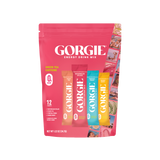 Showcases a pink pouch of Gorgie Energy Drink Mix with peach tea, watermelon splash, tropical punch, and mango burst flavors.
