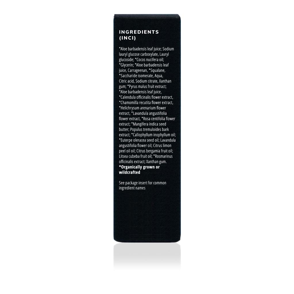 Cosmetic product packaging displays a detailed list of organic ingredients, emphasizing aloe, botanical extracts, and essential oils.
