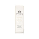 Annmarie Probiotic Serum, a bio facial elixir for all skin types including sensitive skin, stands on a white surface.

