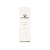 Annmarie Probiotic Serum, a bio facial elixir for all skin types including sensitive skin, stands on a white surface.
