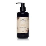 Annmarie Radiant Skin Silk Luxurious Body Moisturizer sits elegantly in a black pump bottle.
