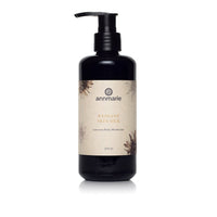 Annmarie Radiant Skin Silk Luxurious Body Moisturizer sits elegantly in a black pump bottle.
