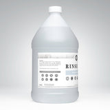 Rustic Strength presents a bottle of their eco-friendly, hypoallergenic Rinse Aid for sparkling, spot-free dishes.
