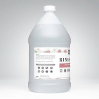 A bottle of Rustic Strength Light Cherry scented rinse aid promises sparkling, spot-free dishes with a biodegradable and septic-safe formula.