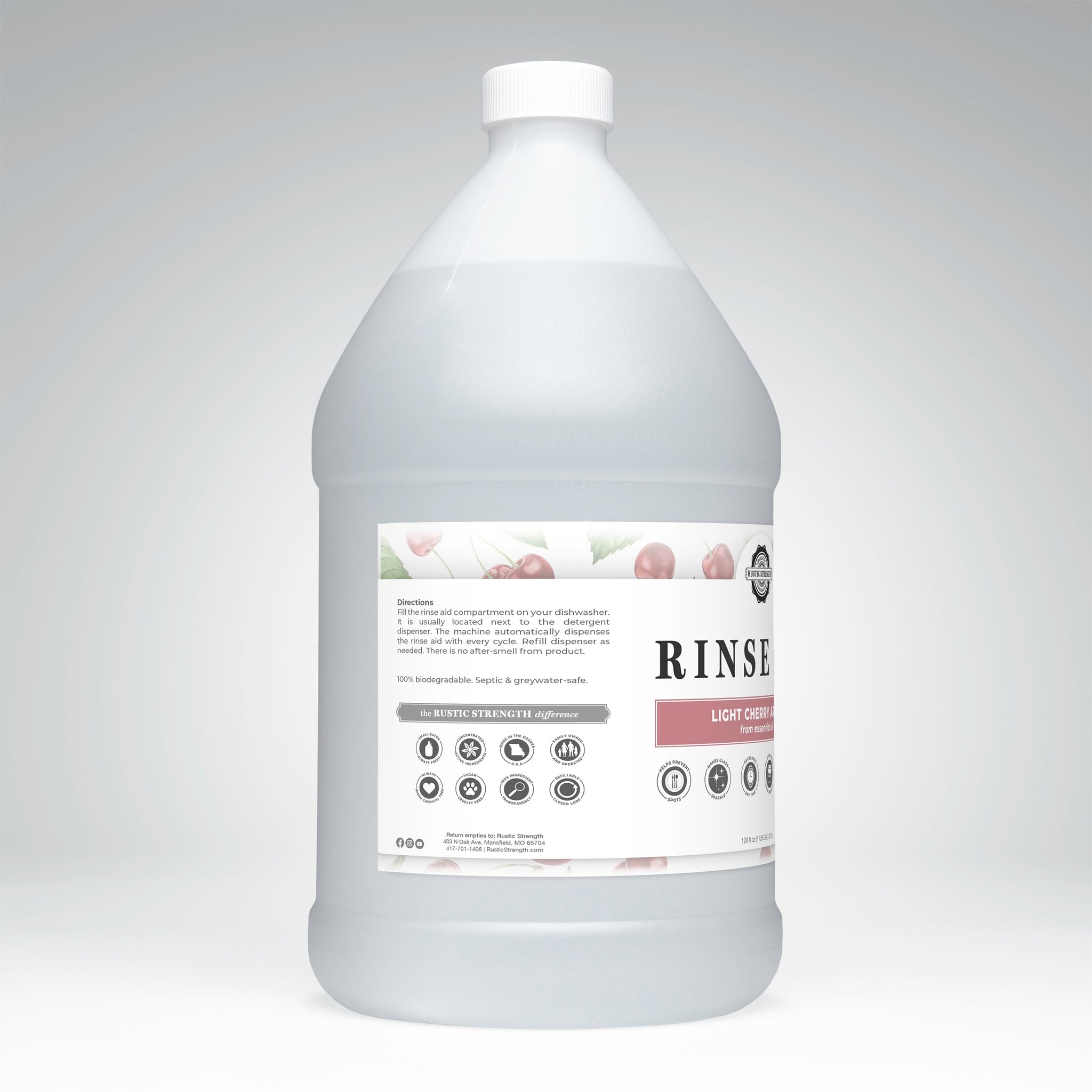 A bottle of Rustic Strength Light Cherry scented rinse aid promises sparkling, spot-free dishes with a biodegradable and septic-safe formula.