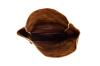 View shows the inside of a brown leather tote bag with an inner pocket against a white background.
