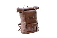 Showcases a rugged brown leather roll-top backpack featuring adjustable straps and a front pocket, perfect for everyday adventures.
