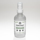 A bottle of Rustic Strength Eucalyptus Room Spray promises a natural, dye-free, and phthalate-free way to curate a space of wellness.
