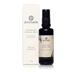 Annmarie's Rosemary Toning Mist for face, body, and hair sits beside its product box, advertising suitability for all skin types including oily skin.
