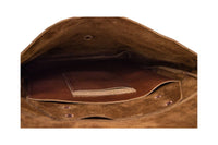 View showcases the interior of a brown leather messenger bag with a suede lining and organizational pockets.
