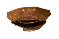 View shows the interior of an open brown leather satchel with pockets and brass details.
