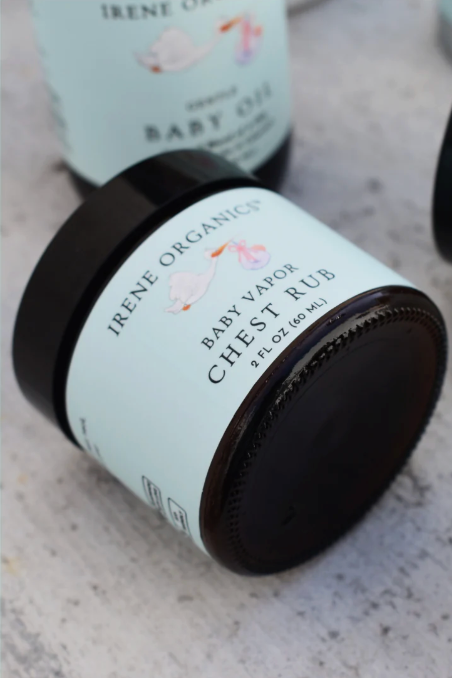 Irene Organics baby vapor chest rub jar on a light surface