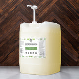 Rustic Strength showcases a large container of rosemary and mint soothing shampoo, designed for all ages and hair types, with a pump dispenser.