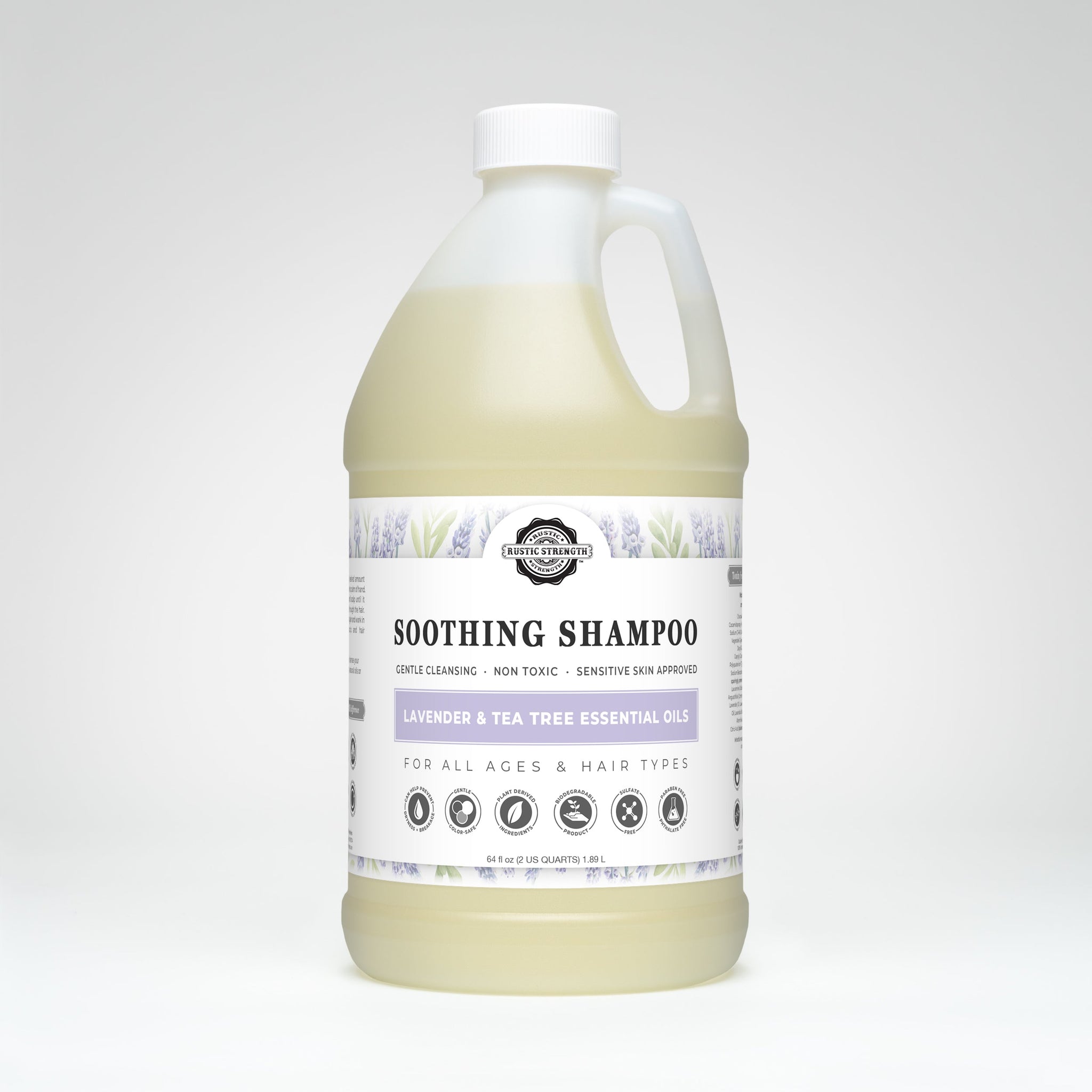 Showcases a large bottle of Rustic Strength Soothing Shampoo with lavender and tea tree essential oils for all ages and hair types.