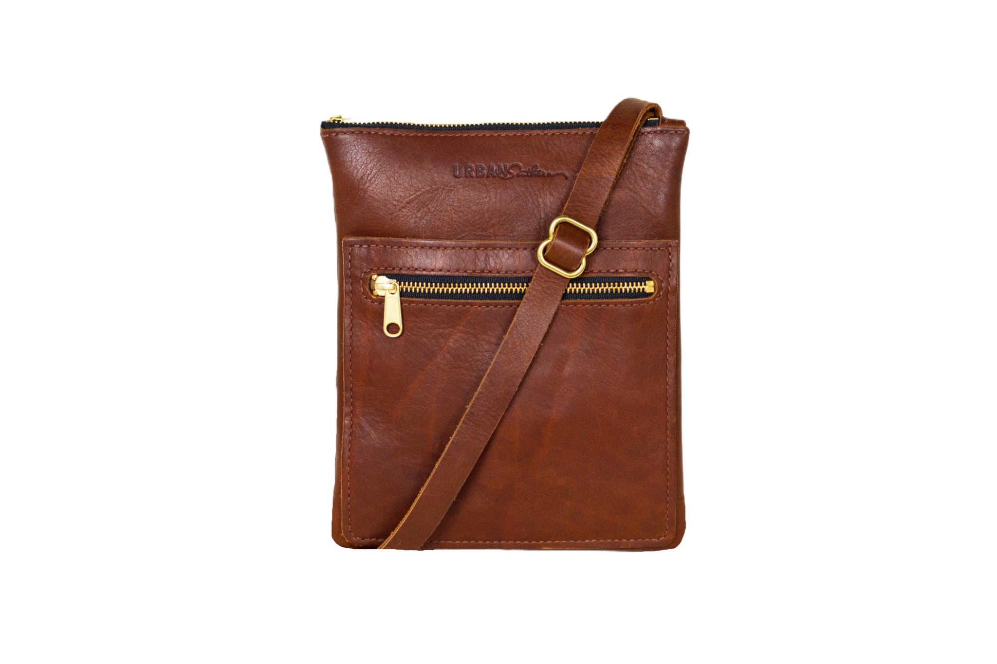 Display shows a brown leather crossbody bag with gold zippers and adjustable strap.
